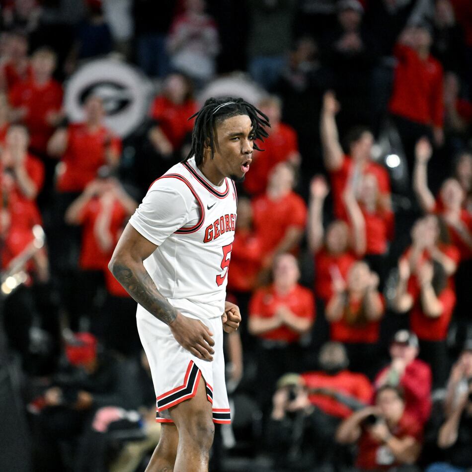Georgia guard Jeremiah Wilkinson (5) reacts after scoring during the second half in an NCAA college basketball game at Stegeman Coliseum, Saturday, Jan. 17, 2026, in Athens. Georgia won 90-76 over Arkansas. (Hyosub Shin/AJC)
