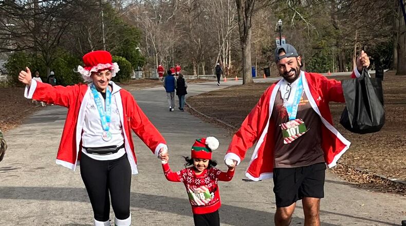 Participants in the Atlanta Jingle Bell Jog 5K will receive Santa suits and jingle bells to tie to their shoes before running in Piedmont Park on Sunday, Dec. 22.