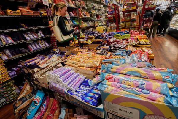 Candies from around the world are displayed for sale at Economy Candy in New York's Lower East Side, Friday, April 4, 2025. (AP Photo/Richard Drew)