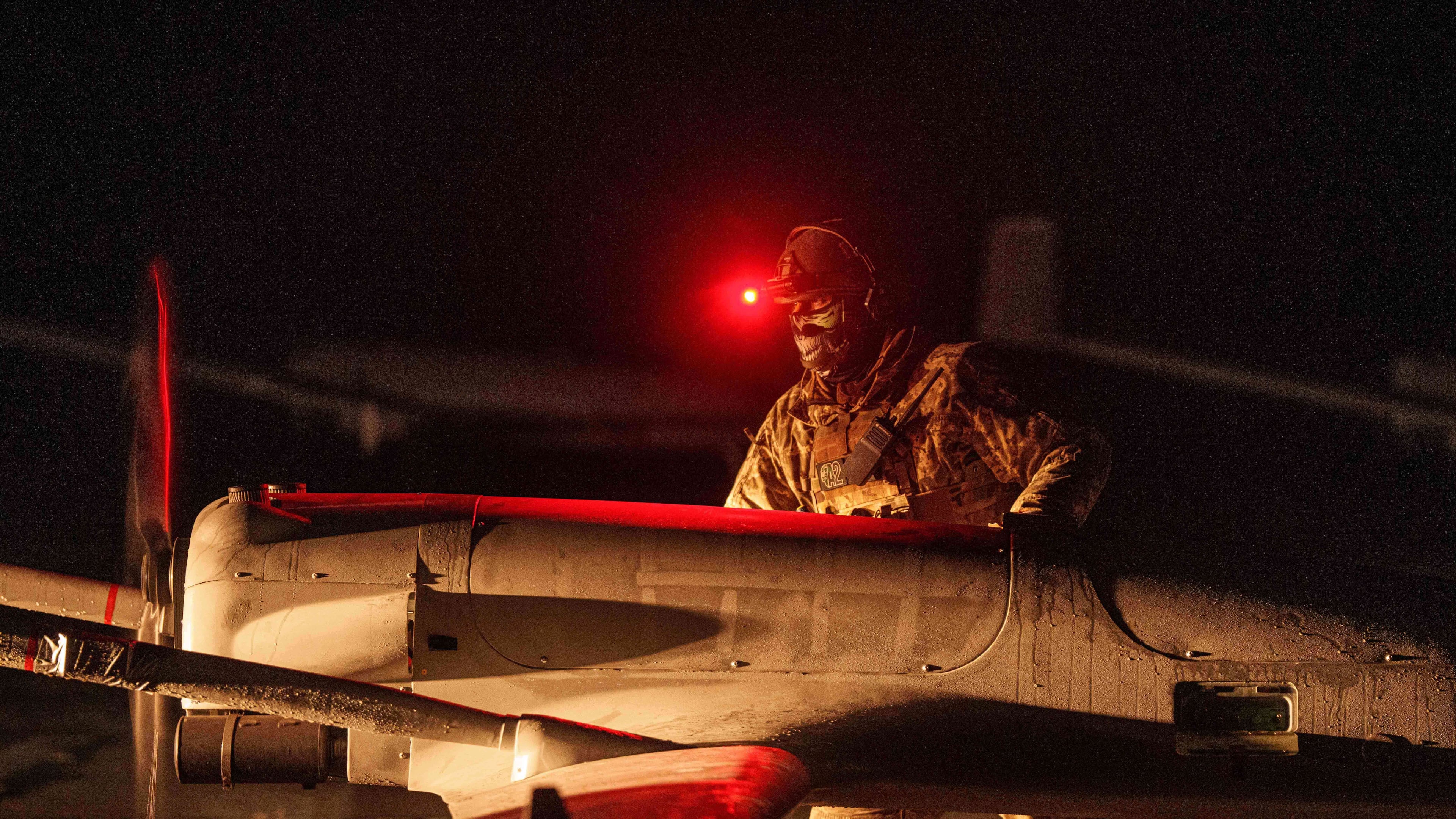 FILE - A Ukrainian serviceman of the 14th Separate Unmanned Aerial Systems Regiment prepares a long-range drone An-196 Liutyi before takeoff in undisclosed location, Ukraine, Tuesday, Oct. 14, 2025. (AP Photo/Evgeniy Maloletka, File)
