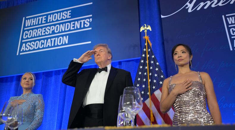 President Donald Trump attends the White House Correspondents' Association Dinner, at the Waldorf Astoria Washington DC, Friday, July 24, 2026, in Washington, with with WHCA president Weijia Jiang, right and White House press secretary Karoline Leavitt. (AP Photo/Rod Lamkey, Jr.)
