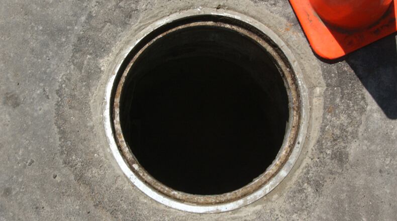 Fulton County crews will be clearing sanitary sewer easements in Johns Creek to ensure access to manholes. AJC FILE