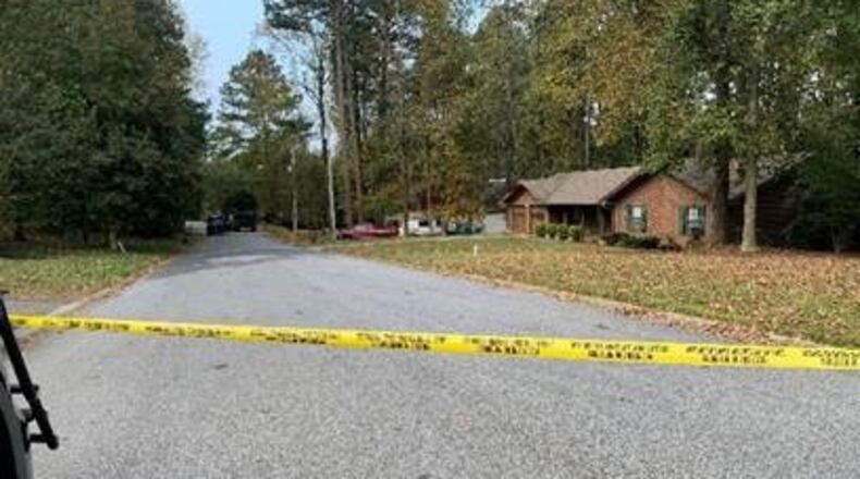 Police said the man was killed after shooting at officers following a six-hour standoff at a home near Lilburn.
