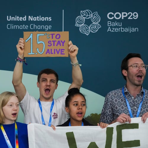 FILE - Activists participate in a demonstration for phasing out fossil fuels at the COP29 U.N. Climate Summit, Nov. 19, 2024, in Baku, Azerbaijan. (AP Photo/Sergei Grits, File)