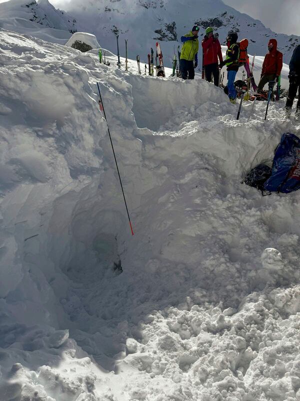 This photo released by the Italian National Alpine and Speleological Rescue Corps on Tuesday, April 1, 2025, shows the place where three skiers were buried by an avalanche on Giau Pass on March 16, 2025. (Italian National Alpine and Speleological Rescue Corps via AP)