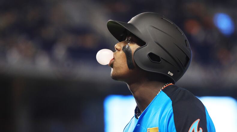 Ronald Acuna drove in two runs and scored three runs Thursday night. (Photo by Mike Ehrmann/Getty Images)