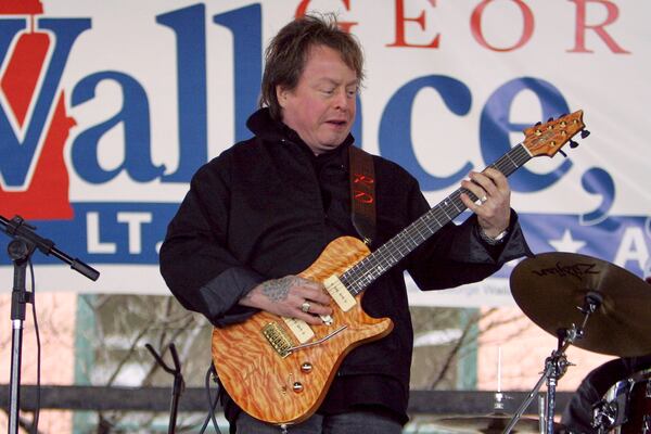 FILE - Singer Rick Derringer performs during a campaign rally kicking off George Wallace Jr's bid for the office of lieutenant governor in Montgomery, Ala., on Feb. 18, 2006. (AP Photo/Rob Carr, File)