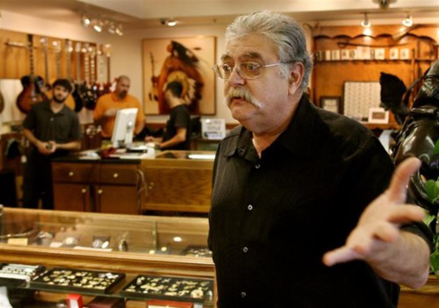 Downturn boosts business at pawn shops