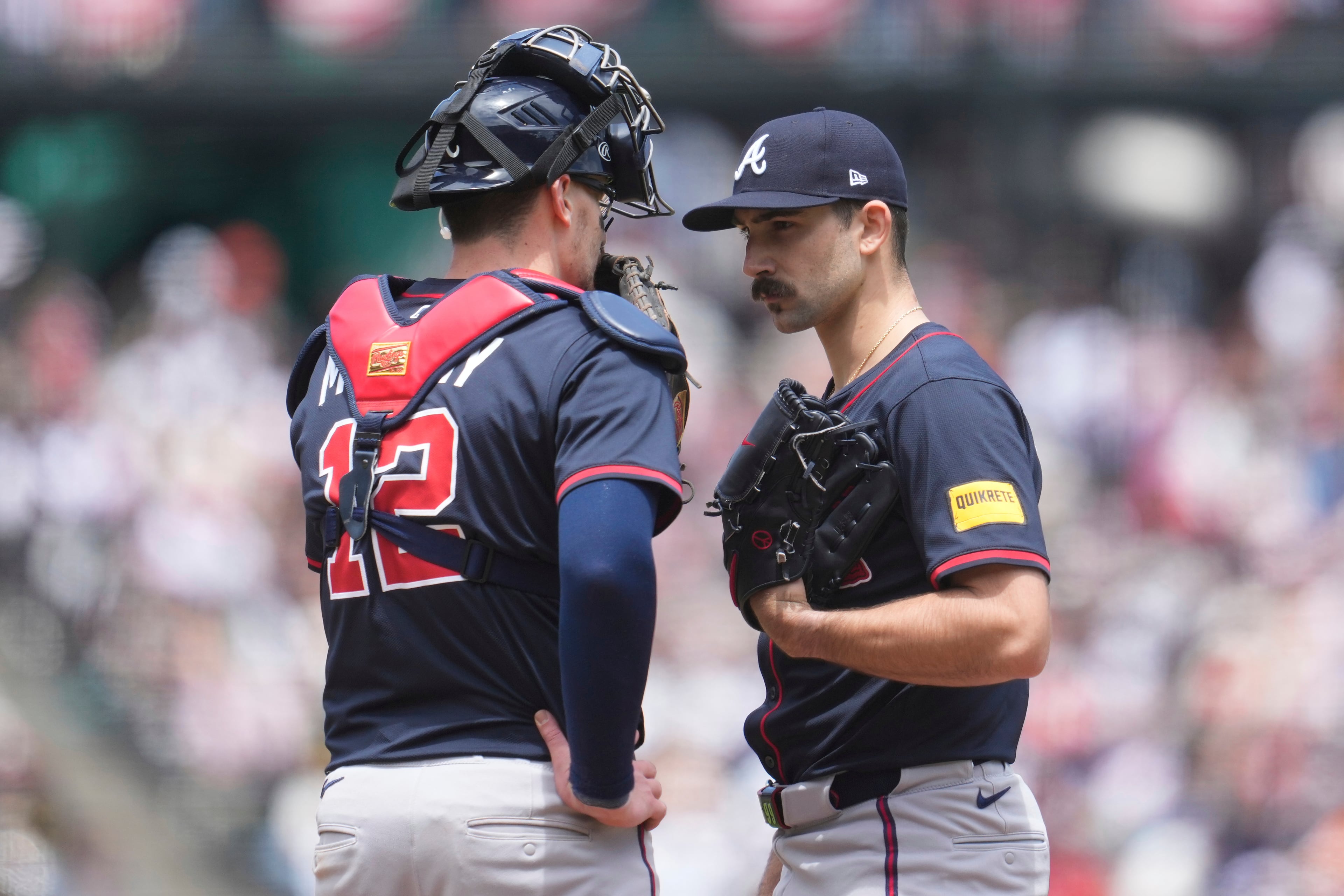 Atlanta Braves catcher Sean Murphy, left, meets on the mound with pitcher Spencer Strider during the fourth inning of a baseball game against the San Francisco Giants in San Francisco, Sunday, June 8, 2025. (AP Photo/Jeff Chiu)