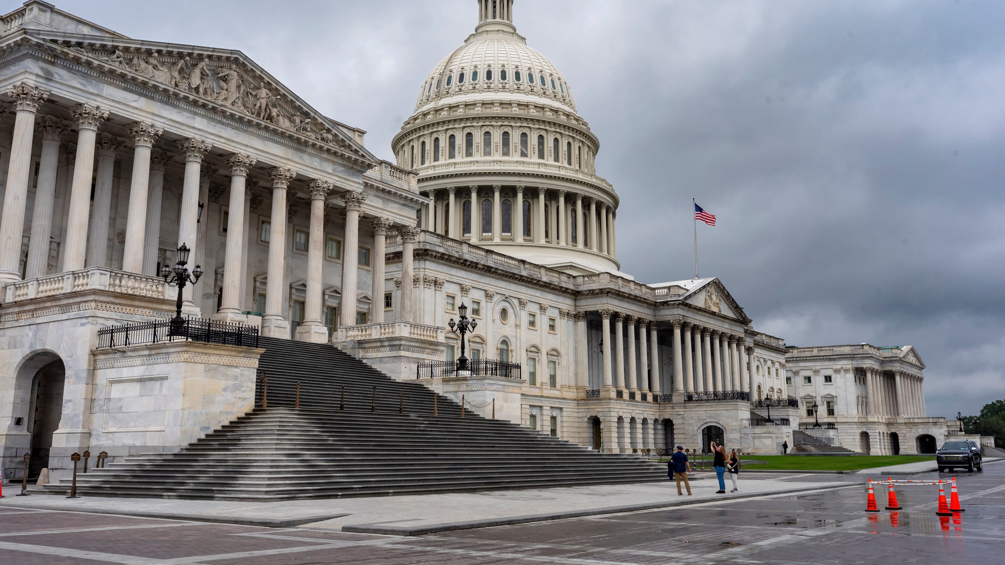 The Capitol is seen during rainy weather just days before federal money runs out which could trigger a government shutdown, in Washington, Thursday, Sept. 25, 2025. (AP Photo/J. Scott Applewhite)
