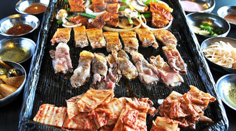 Korean BBQ- unlimited pork belly, beef brisket BBQ, and Bi-bim-bab at Iron Age.