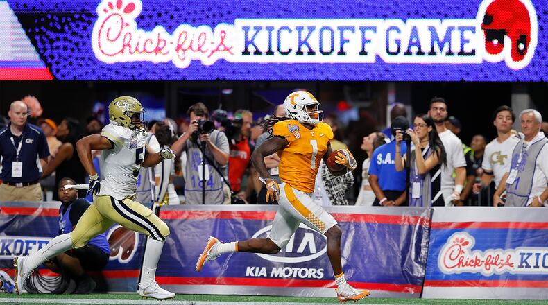 ATLANTA, GA - SEPTEMBER 04: Marquez Callaway #1 of the Tennessee Volunteers rushes for a touchdown past A.J. Gray #5 of the Georgia Tech Yellow Jackets at Mercedes-Benz Stadium on September 4, 2017 in Atlanta, Georgia. (Photo by Kevin C. Cox/Getty Images)