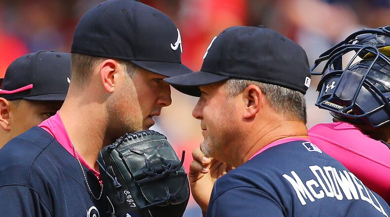 Braves starting pitcher Alex Wood gets a visit on the mound from pitching coach Roger McDowell in the 7th inning against the Nationals during a baseball game on Sunday, May 10, 2015, at Nationals Park in Washington, D.C. Curtis Compton / ccompton@ajc.com