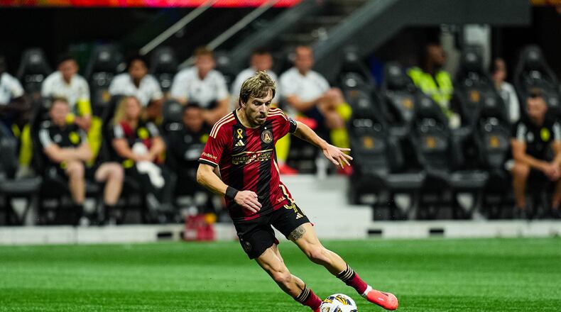 Atlanta United forward Saba Lobjanidze #9 passes the ball during the match against the Nashville SC at Mercedes-Benz Stadium in Atlanta, GA on Saturday September 14, 2024. (Photo by Madelaina Polk/Atlanta United)