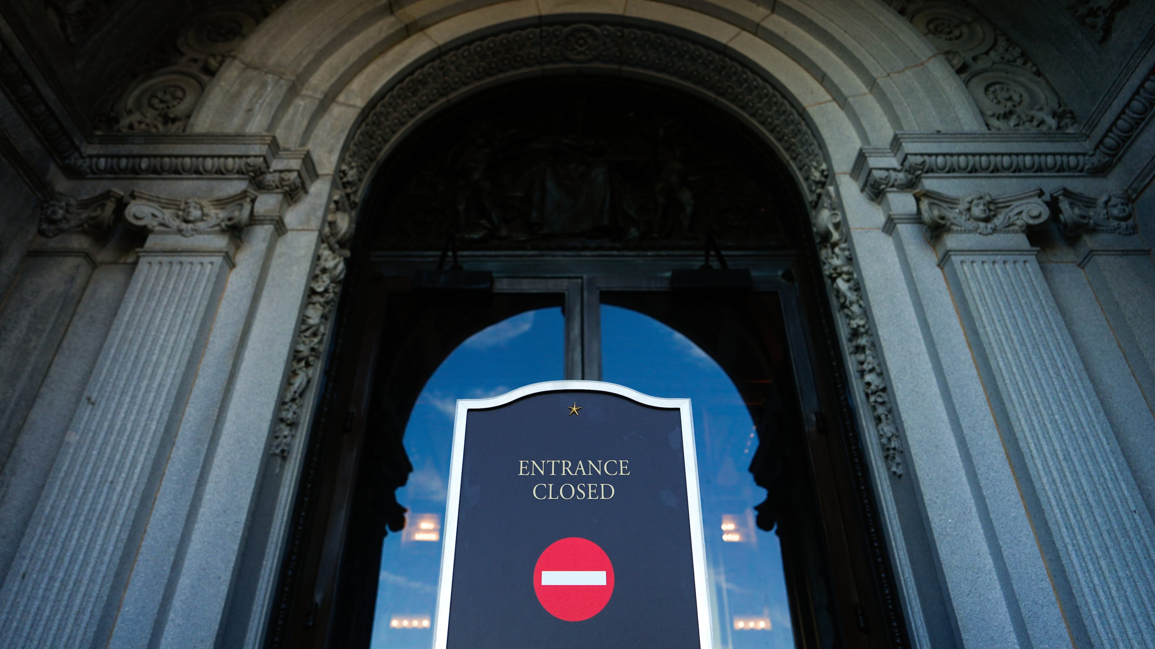A sign announces that the Library of Congress is closed, on the first day of a partial government shutdown, Wednesday, Oct. 1, 2025, in Washington. (AP Photo/Julia Demaree Nikhinson)