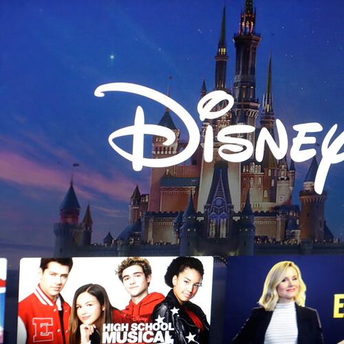 FILE - In this Nov. 13, 2019 file photo, a Disney logo forms part of a menu for the Disney Plus movie and entertainment streaming service on a computer screen in Walpole, Mass. (AP Photo/Steven Senne, File)