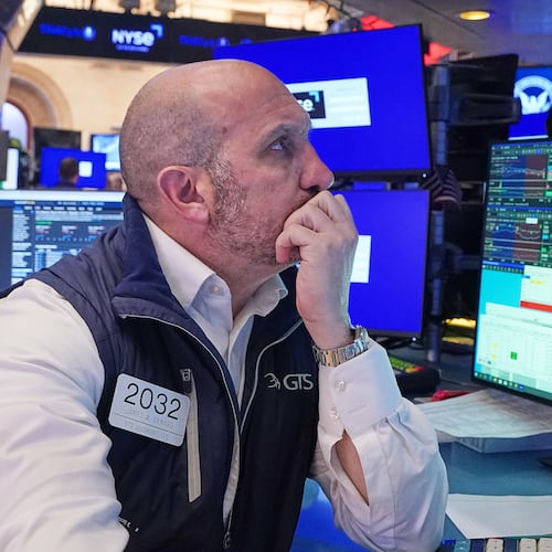 Specialist James Denaro works at his post on the floor of the New York Stock Exchange, Monday, April 20, 2026. (AP Photo/Richard Drew)