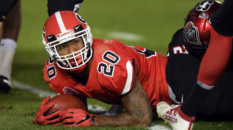 National Team running back Brian Herrien (20) from Georgia drops over the goal line, scoring a touchdown during the NFLPA Collegiate Bowl Jan. 18, 2020, at the Rose Bowl in Pasadena, Calif.
