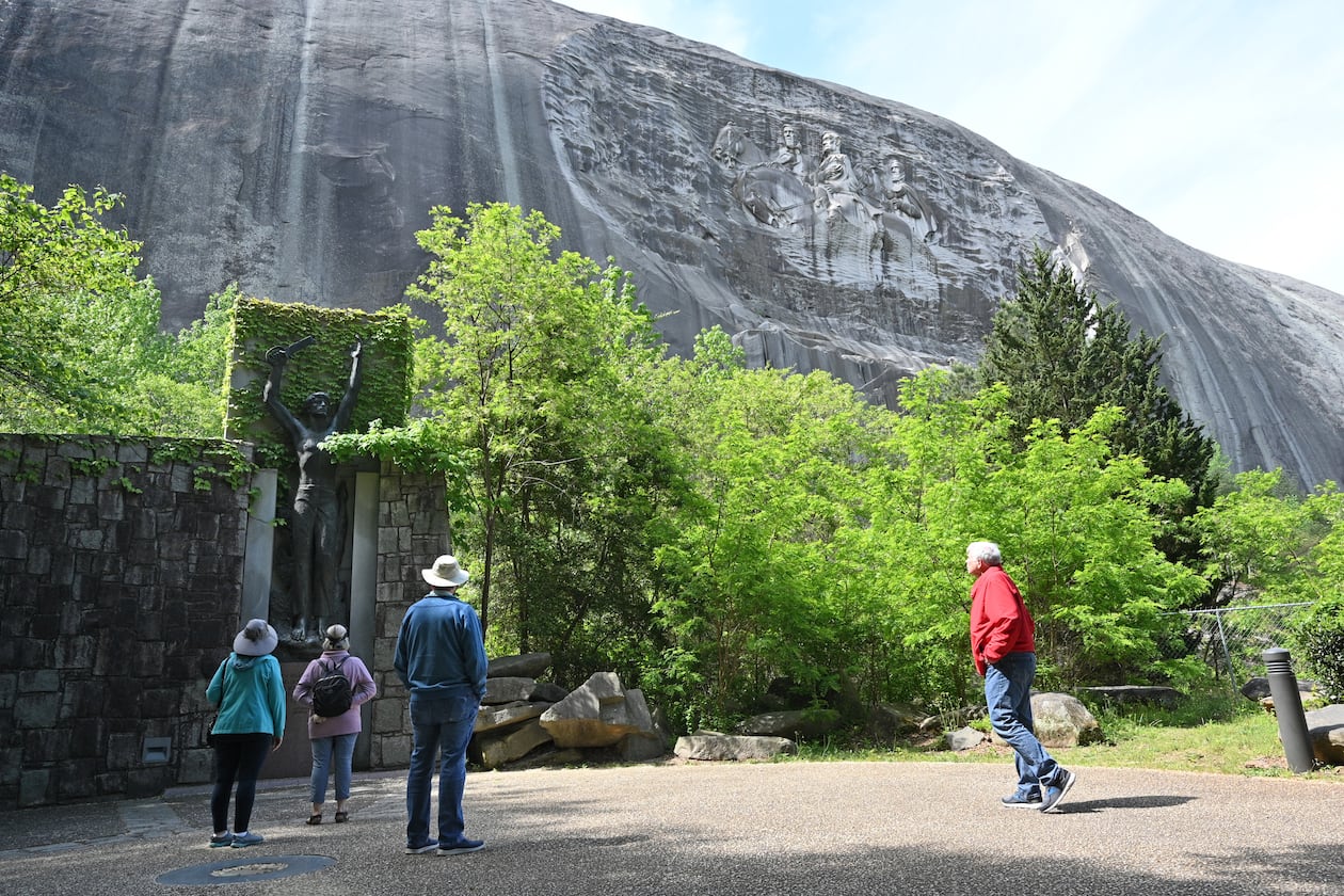 April 20, 2021 Stone Mountain - Park goers walk around Valor Park were Statue of Valor is located at Stone Mountain Park on Tuesday, April 20, 2021. (Hyosub Shin / Hyosub.Shin@ajc.com)