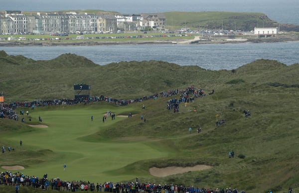 FILE - Northern Ireland's Rory McIlroy plays his approach shot to the 7th green during the first round of the British Open Golf Championships at Royal Portrush in Northern Ireland, July 18, 2019. (AP Photo/Matt Dunham, File)