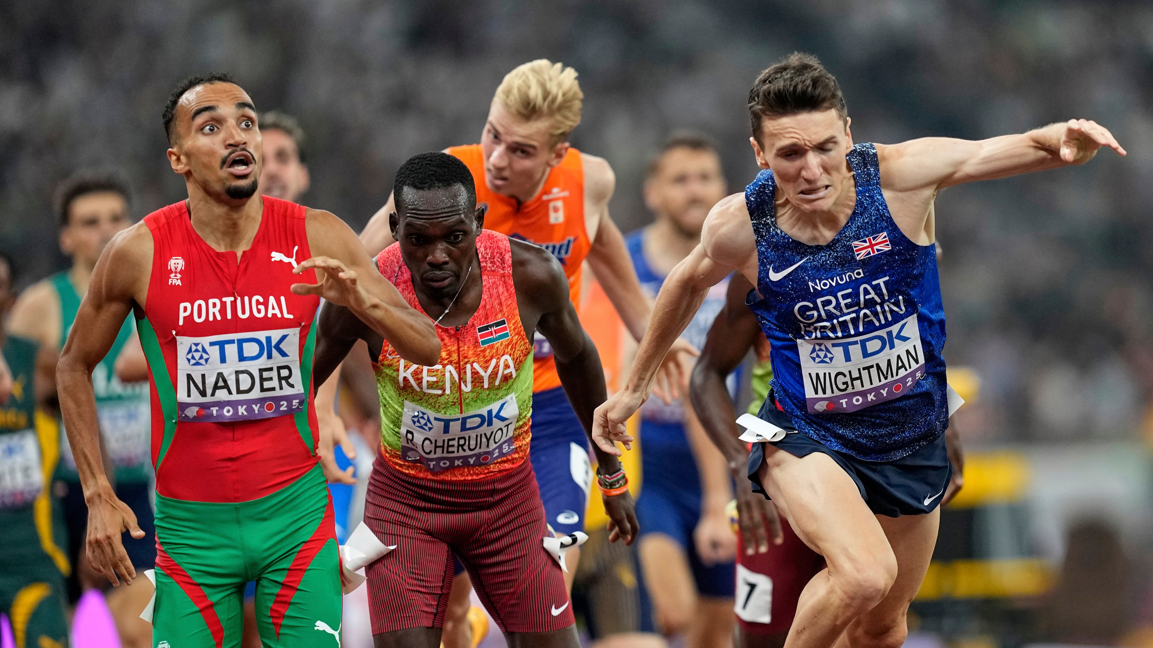 Portugal's Isaac Nader celebrates after winning the gold medal ahead of Britain's Jake Wightman in the men's 1,500 meters final at the World Athletics Championships in Tokyo, Wednesday, Sept. 17, 2025. (AP Photo/Petr David Josek)