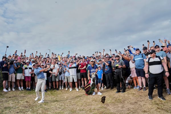 Rory McIlroy of Northern Ireland plays out of the rough on the 17th hole during the final round of the British Open golf championship at the Royal Portrush Golf Club, Northern Ireland, Sunday, July 20, 2025. (AP Photo/Jon Super)