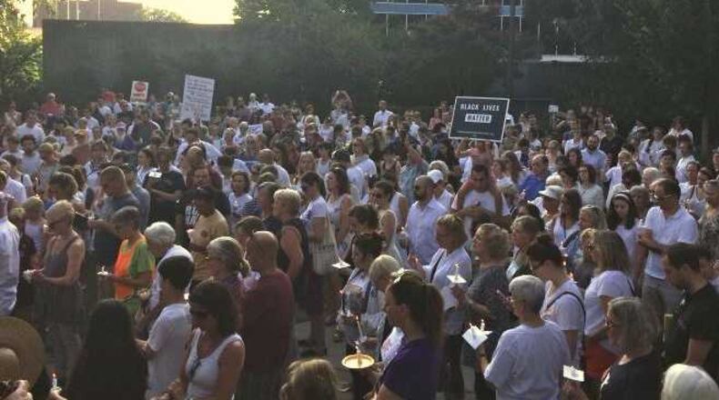 A moment of silence was held at the Decatur Square in DeKalb County on Sunday night.