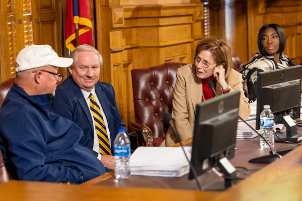 (Left to right) State Election Board member Rick Jeffares, executive director James Mills, vice chair Janice Johnston, and member Janelle King attended a meeting on Wednesday in Atlanta. (Arvin Temkar/AJC)
