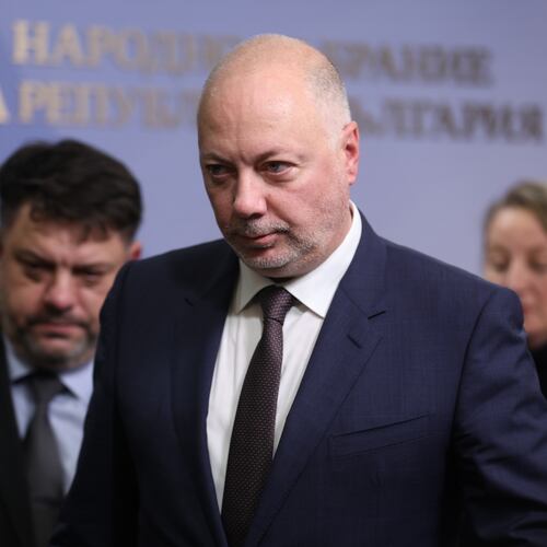 Bulgarian Prime Minister Rosen Zhelyazkov announces that Bulgaria's government resigns following mass protests, at the Bulgarian Parliament in Sofia, Bulgaria, Thursday, Dec. 11, 2025. (Bulgarian News Agency via AP)