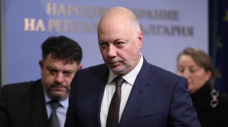 Bulgarian Prime Minister Rosen Zhelyazkov announces that Bulgaria's government resigns following mass protests, at the Bulgarian Parliament in Sofia, Bulgaria, Thursday, Dec. 11, 2025. (Bulgarian News Agency via AP)