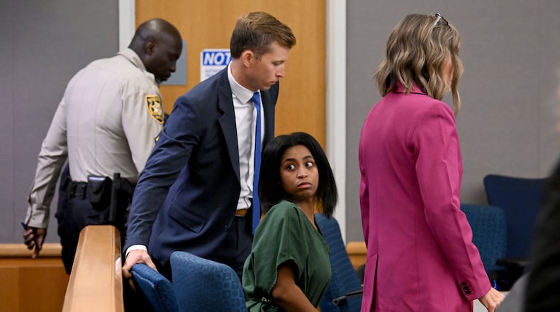 Deja Coleman, who is charged in the death of her 1-year-old son after officials said he was left in a hot car, in the courtroom during a bond hearing before a Gwinnett County Superior Court judge on Wednesday, Sept. 9, 2026. Coleman is charged with second-degree murder and second-degree cruelty to children and was granted bond Wednesday. (Hyosub Shin/AJC)