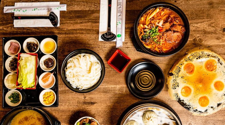 A selection of soups and dumplings at Yunnan Crossing Bridge Rice Noodle in Duluth. CONTRIBUTED BY HENRI HOLLIS