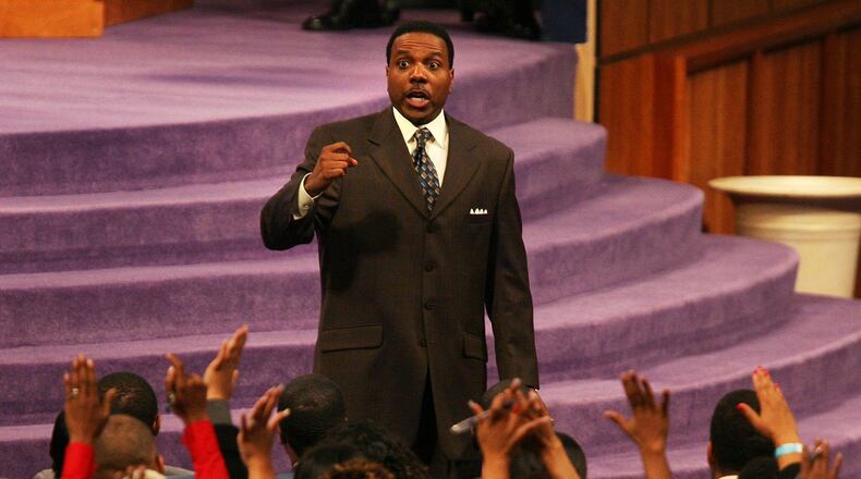 Rev. Creflo Dollar leads his Wednesday night service at World Changers Church International. POUYA DIANAT / AJC file (2007)