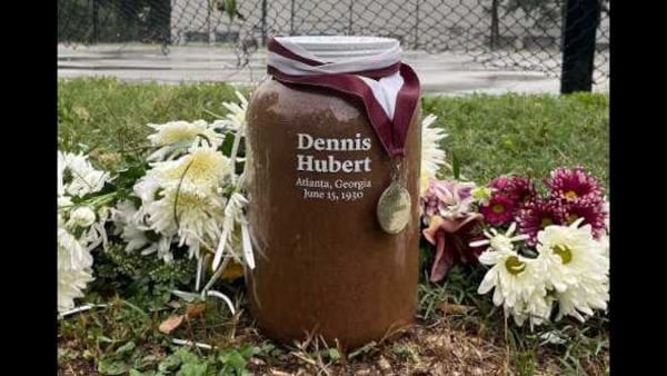 This jar reflects the soil collected from the site where Dennis Hubert was lynched in 1930. Hubert was a sophomore at Morehouse College when he was lynched by a mob of seven white men who falsely accused the 18-year-old of insulting a white woman. Morehouse gave him a posthumous degree during its May 19, 2025 commencement ceremony. Photo Credit: Morehouse College.