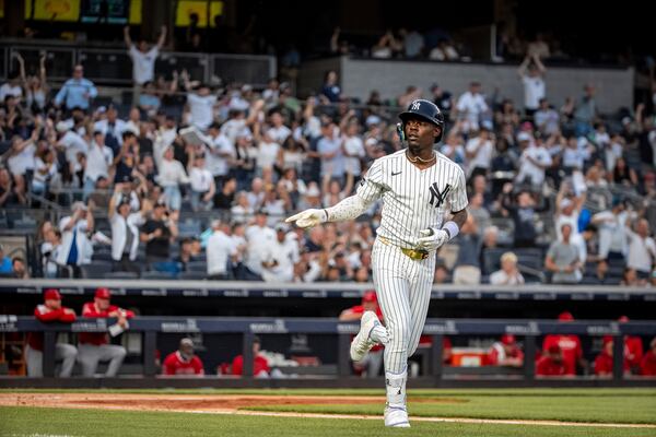 New York Yankees' Jazz Chisholm Jr. (13) celebrates a home run during the second inning of a baseball game against the Los Angeles Angels, Wednesday, June 18, 2025, in New York. (AP Photo/Angelina Katsanis)