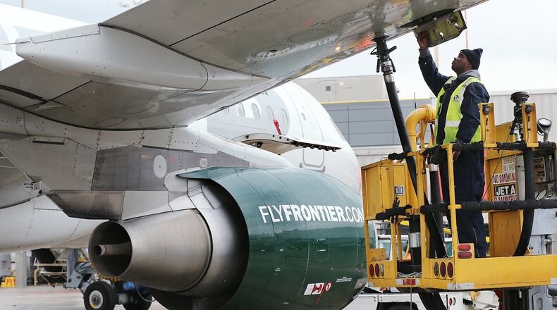 A Frontier Airlines plane is fueled before departing Hartsfield-Jackson International Airport in 2016.