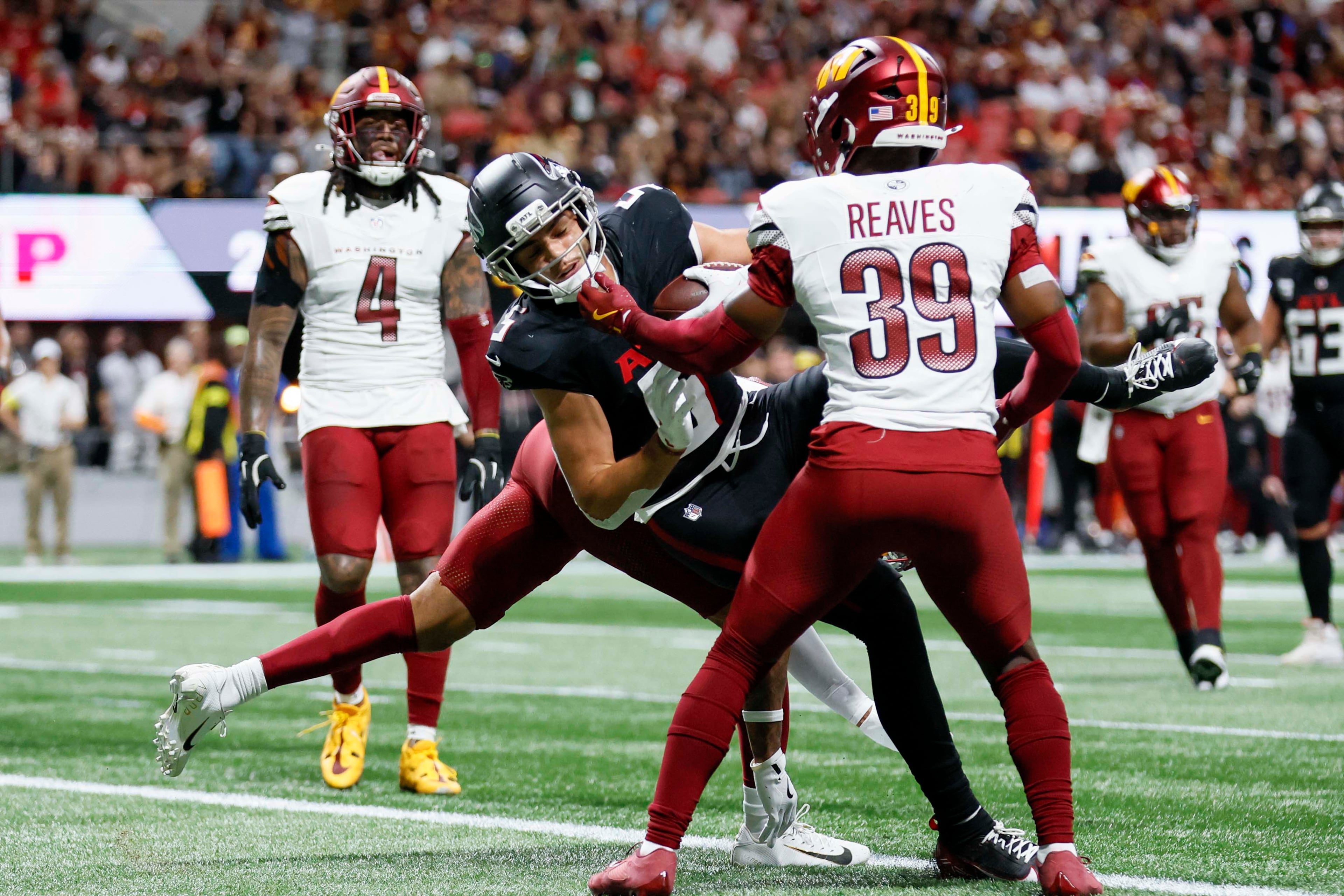 Atlanta Falcons wide receiver Drake London crosses the end zone for his touchdown during the first half of an NFL game against the Washington Commanders at Mercedes-Benz Stadium in Atlanta on Sunday, September 28, 2025. (Miguel Martinez/AJC)
