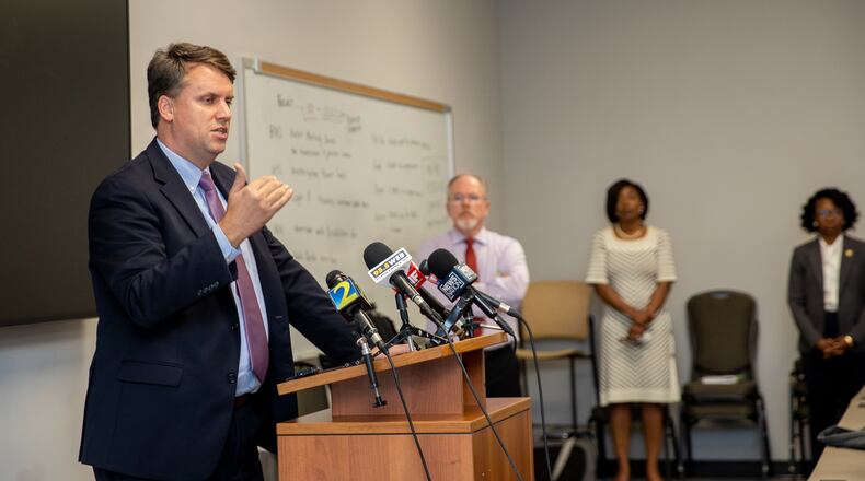 Daniel White, the attorney for the Cobb County elections department, speaks at a press conference Monday, Nov. 7, 2022, to address absentee ballots that were requested but never mailed.  The office is sending out absentee ballots to voters who did not receive them and a judge is allowing the county to count those ballots postmarked by Election Day and received by Nov. 14. (Jenni Girtman for The Atlanta Journal-Constitution)