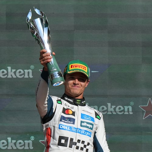 McLaren driver Lando Norris of Britain celebrates after winning the Formula One Mexico Grand Prix in Mexico City, Sunday, Oct. 26, 2025. (AP Photo/Fernando Llano)