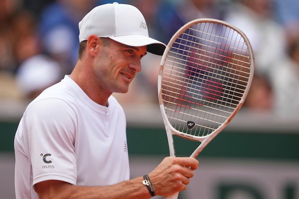 Tommy Paul of the U.S. reacts as he plays Denmark's Elmer Moller during their first round match of the French Tennis Open at the Roland Garros stadium, in Paris, Sunday May 25, 2025. (AP Photo/Lindsey Wasson)