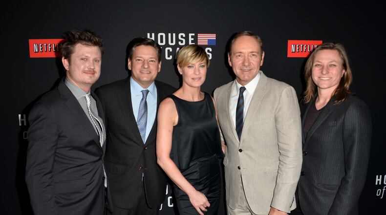 LOS ANGELES, CA - FEBRUARY 13: Writer Beau Willimon, Netflix chief content officer Ted Sarandos, actress Robin Wright, executive producer/actor Kevin Spacey and Netflix Vice president for original series Cindy Holland arrive at the special screening of Netflix's "House of Cards" Season 2 at the Directors Guild Of America on February 13, 2014 in Los Angeles, California. (Photo by Kevin Winter/Getty Images)