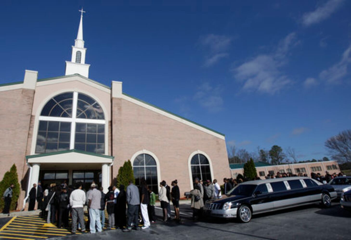Mourners gather at funeral for Slim Dunkin