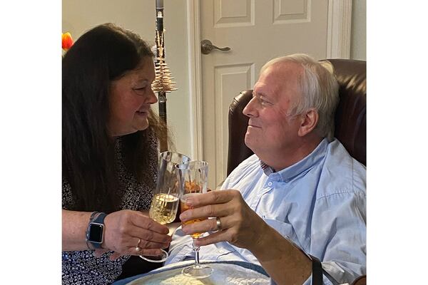 Nancy Nydam with her husband and former 11Alive reporter Jon Shirek getting married on Feb. 4, 2025, about 10 weeks before his death. She said they had been together since 1999. (CONTRIBUTED)