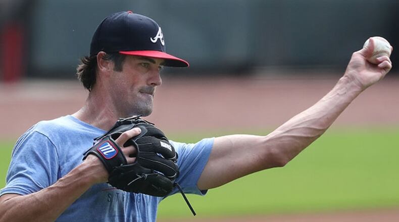 Braves pitcher Cole Hamels gets in some work from the mound running drills during the first workout of summer Friday July 3, 2020, at Truist Park in Atlanta.