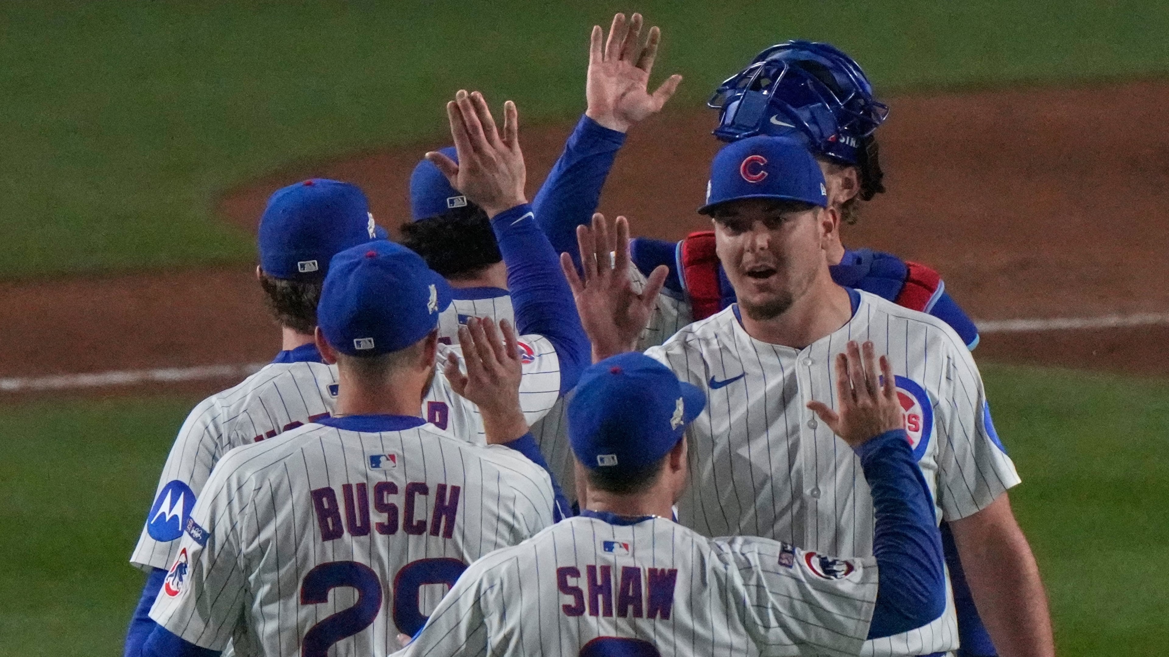 Chicago Cubs players celebrate after Game 3 of baseball's National League Division Series against the Milwaukee Brewers Wednesday, Oct. 8, 2025, in Chicago. (AP Photo/Nam Huh)