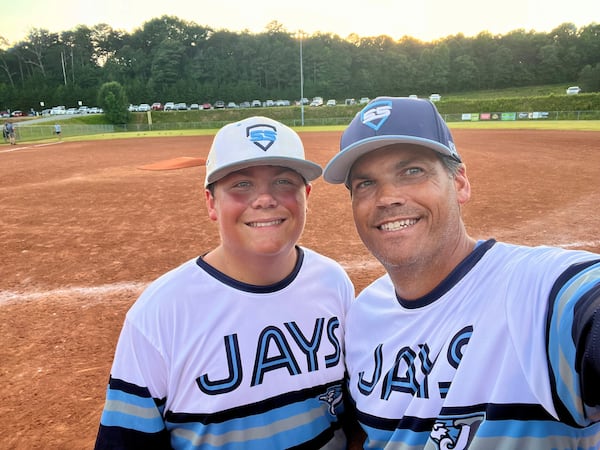 AJC contributor Geoff Duncan (right) takes a selfie with his son, Ryder, before the game in which Ryder hit his first-ever home run. (Courtesy of Geoff Duncan)
