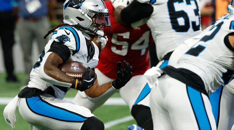 Carolina Panthers running back Jonathon Brooks (25) rushes the ball during an NFL football game against the Atlanta Falcons in Atlanta, Sunday, Sept. 20, 2026. (AP Photo/Erik S. Lesser)