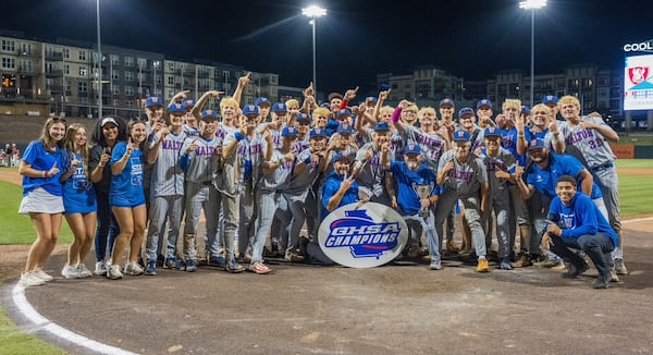 Walton High School baseball celebrates winning a state title Tuesday at Coolray Field.