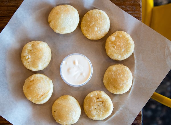 Venezuelan restaurant Arepa Mia, which makes arepitas fritas, announced this week it would extend its fundraiser for earthquake victims through the month of July. (Henri Hollis/AJC)