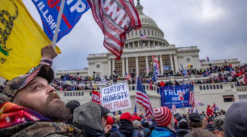 Supporters of President Donald Trump storm the U.S. Capitol building on Wednesday. Many in Washington are concerned that riots will return around the inauguration Jan. 20. Washington Post photo by Evelyn Hockstein